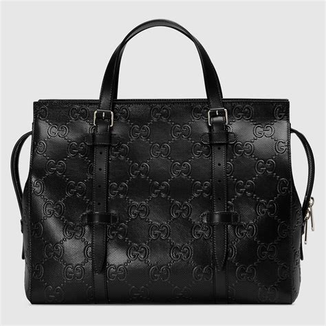 gucci black leather embossed handbag